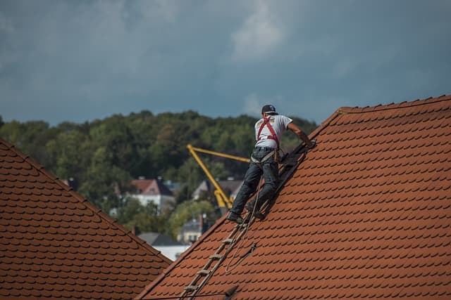 roofer increasing value of home by replacing roof