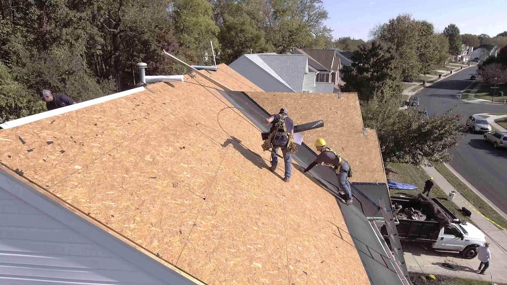 rotted roof decking being replaced