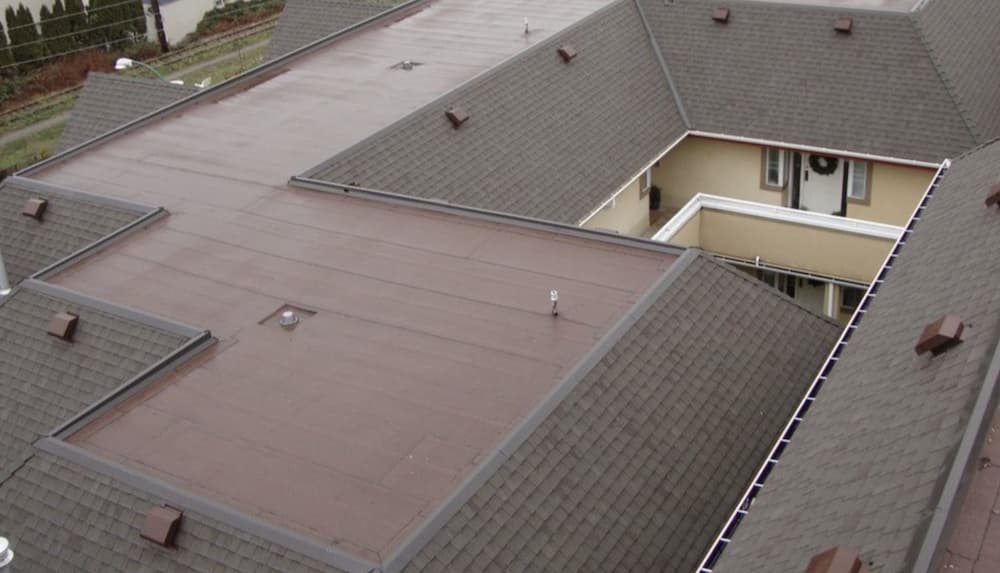 residential flat roof over a townhouse complex requires a flat roof maintenance checklist