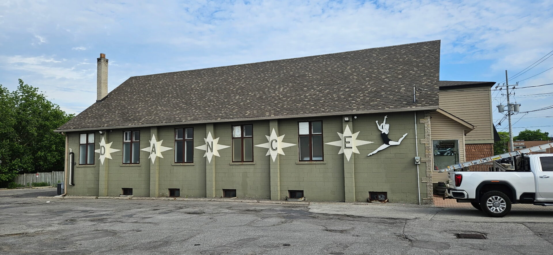 completed asphalt shingle roof replacement by CD Roofing on a commercial building in Ontario