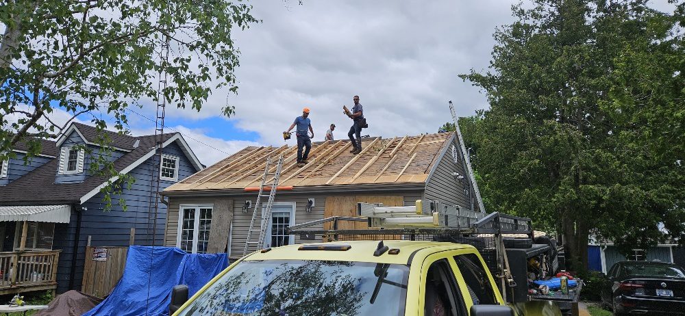 New plywood roof deck rebuilt flat and straight over new rafters on an Ajax wartime home